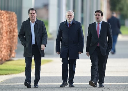 Steve Rotherham, Jeremy Corbyn and Andy Burnham walking down a street