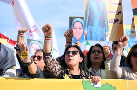 Iranian opposition supporters stage a demonstration in Brussels to mark the first death anniversary of Mahsa Amini