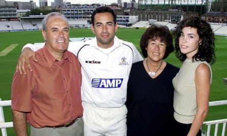 Adam Hollioake with his parents John and Daria and his sister Eboni.