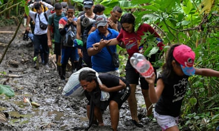 Venezuelan migrants arrive at Canaan Membrillo village, the first border control of the Darién Province in Panama, in October 2022.