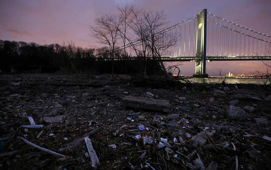 Debris sits on a still-closed beach area damaged by flooding from Hurricane Sandy near the Verrazano-Narrows Bridge on March 1, 2013 in the Staten Island borough of New York City.