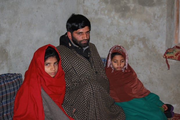 Abdul Aziz Khatana and his children in their winter home.