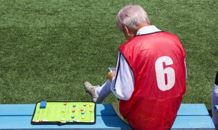A Red Stars player with a tactics board
