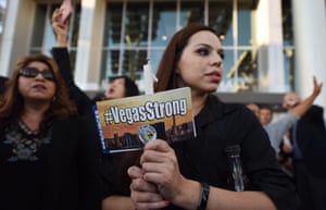 A woman at a vigil outside Las Vegas City Hall