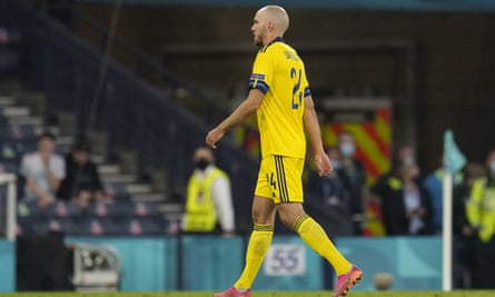 Sweden’s Marcus Danielson leaves the pitch after he was shown the red card for his challenge on Ukraine’s Artem Besyedin in extra time.