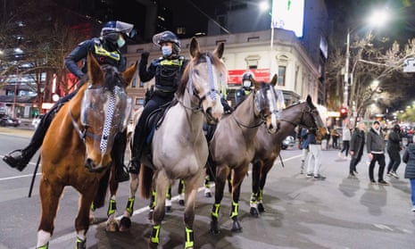 Police horses on Bourke Street, Melbourne during a protest in August 2021