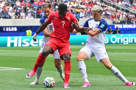 Breel Embolo is tackled by Nikola Katic and Tarik Muharemovic.