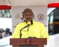 An elderly African man speaking at a lectern