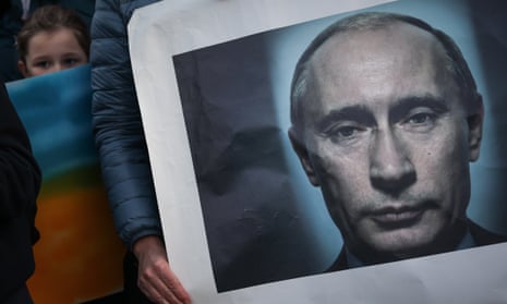 Placard with face of Vladimir Putin.