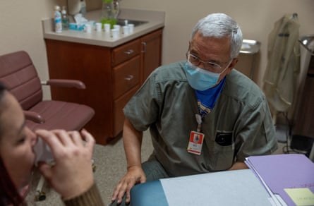 Dr. Franz Theard watches a patient take mifepristone, the first medication in a medical abortion at his clinic, Women’s Reproductive Clinic of New Mexico, in Santa Teresa, U.S., January 13, 2023.