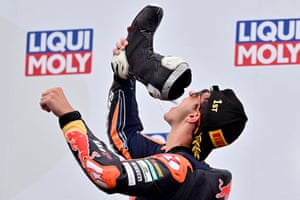 Rueda drinks champagne from his boot