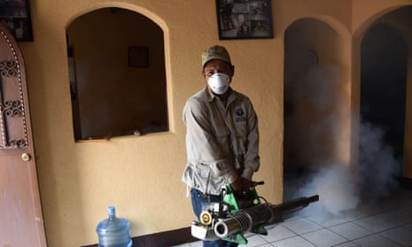 Health ministry employees fumigate against the Aedes aegypti mosquito, vector of the dengue, Zika and Chikungunya viruses, in Guatemala City.