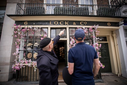 Exterior of the shop with two men in front of it