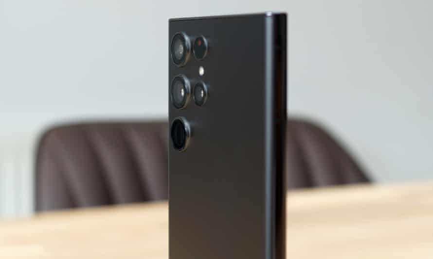 the camera lenses pictured protruding slightly from the glass back of the S22 Ultra