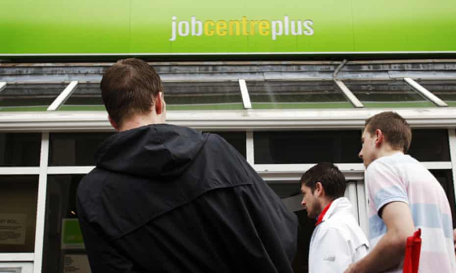 People stand outside a jobcentre in Chatham