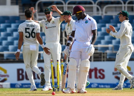 Mitchell Starc celebrates his fifth wicket as he leads Australia to victory over West Indies