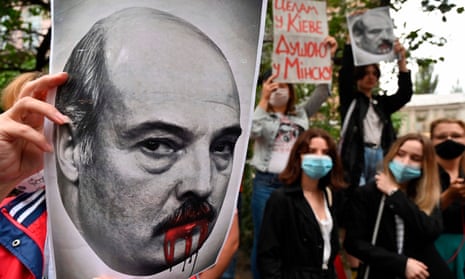 A placard depicting Alexander Lukashenko seen at a rally outside the Belarusian embassy in Kyiv on Thursday.