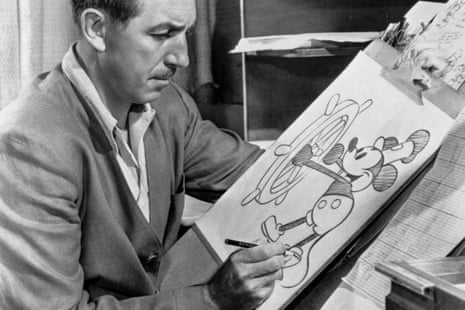 A man draws a cartoon character.