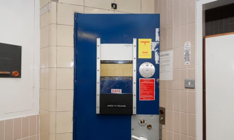 Policy custody suite door in London.