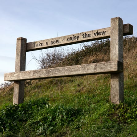 A bench engraved with ‘Take a pew – enjoy the view’