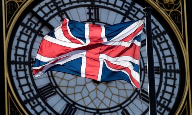 The union flag obscures the Big Ben clock face.