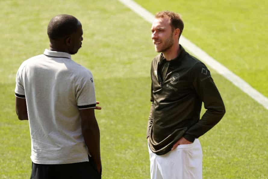 Eriksen speaks with former Spurs teammate Moussa Sissoko, now of Watford, before their game last weekend.