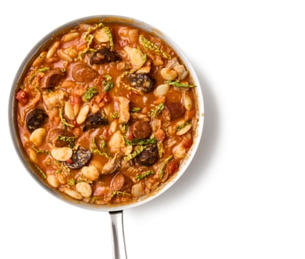 Felicity Cloake’s Portuguese feijoada 07a. n stir in the fried chouriço (and morçela) and the cabbage, and cook for another few minutes, to wilt the cabbage.