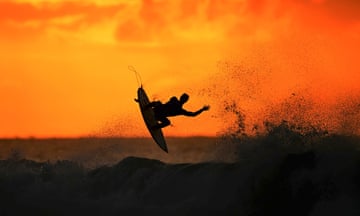 2024 Rip Curl Pro Bells Beach<br>BELLS BEACH, AUSTRALIA - MARCH 27: A surfer warms up at sunrise ahead of the 2024 Rip Curl Pro Bells Beach on March 27, 2024 in Winkipop, Australia.  (Photo by Morgan Hancock/Getty Images)