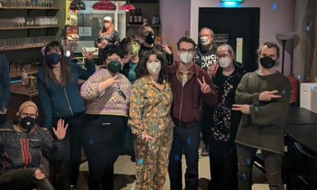 Group of friends in face masks in a bar in Sheffield