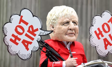 A protester dressed as Boris Johnson