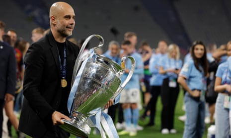 Pep Guardiola with the Champions League trophy after the final between Manchester City and Internazionale at the Ataturk Olympic Stadium on 10 June 2023