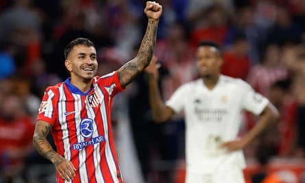 Angel Correa celebrates the equaliser.