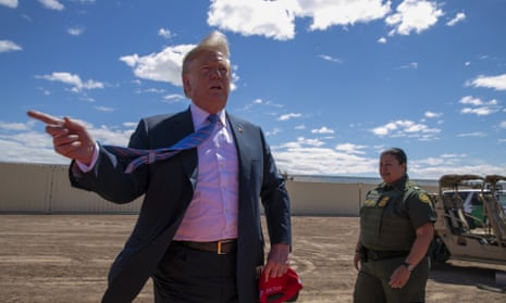 Donald Trump visits a new section of the border wall with Mexico in Calexico, California, in April.