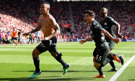 Gabriel Jesus leads the celebratory charge after scoring the late goal that took Manchester City to 100 points and a 1-0 win over Southampton.