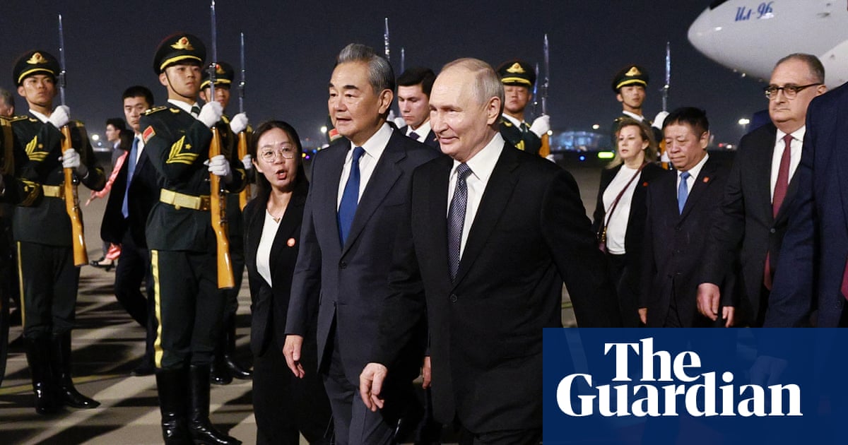 Vladimir Putin arrives in Beijing for state visit hot on heels of Trump
