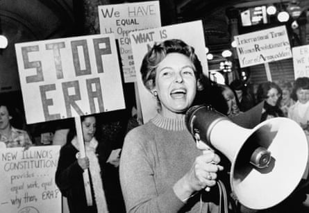 Phyllis Schlafly leads a crowd demonstrating against the equal rights amendment, which would guarantee equal legal rights for all American citizens regardless of sex, in 1976 (Photo by Bettmann Archive/Getty Images)
