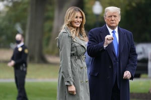 Donald and Melania Trump walk to Marine One on the South Lawn of the White House.