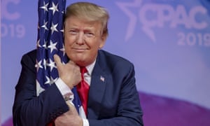 Donald Trump hugs the US flag during CPAC 2019. 2297.jpg?width=300&quality=85&auto=forma