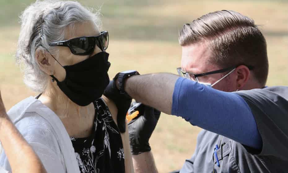 A woman receives a Covid-19 booster shot in Pasadena, Los Angeles county, California, this week.