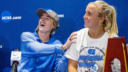 UNC field hockey coach Erin Matson, left, shares a laugh with sophomore Ryleigh Heck after UNC defeated Northwestern for the NCAA title last month.