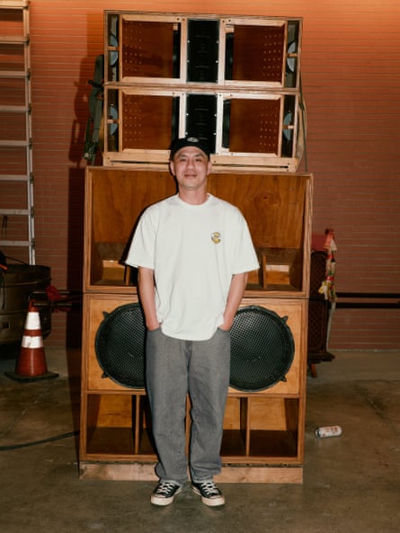 Archi Tsai in front of his sound system.