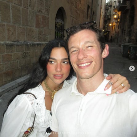 Lipa and Turner in Palermo posing for a selfie in a narrow street