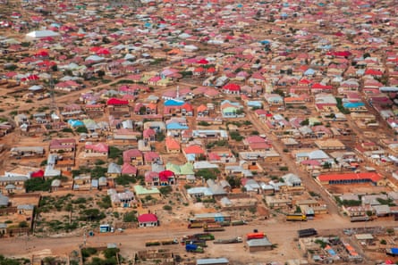 Aerial view of Galkayo with coloured housing on dusty terrain