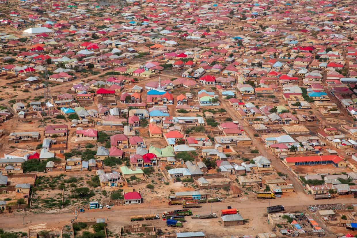 Aerial view of Galkayo with coloured housing on dusty terrain