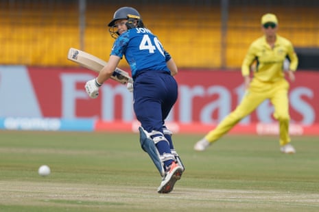 Jones plays a shot.