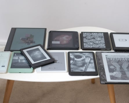 E-readers scattered on a table