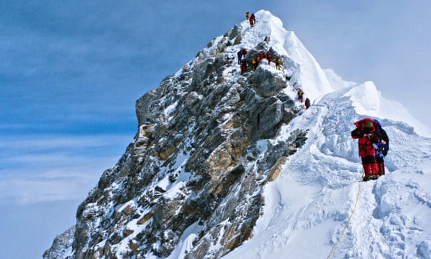 Climbers descending the Hillary Step on Everest in 2010.