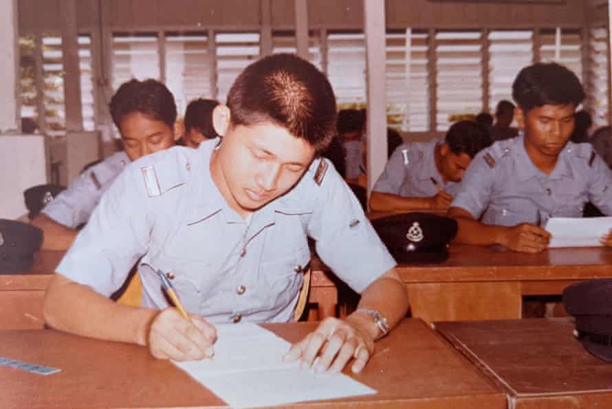 Lim as a young man, sitting his exams to join the Royal Malaysian police