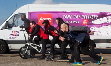 Ex-Olympic sprinter Iwan Thomas (foreground) helps launch the Fast Track service