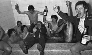 Bournemouth players and backroom staff celebrate the 2-0 victory over Manchester United in January 1984